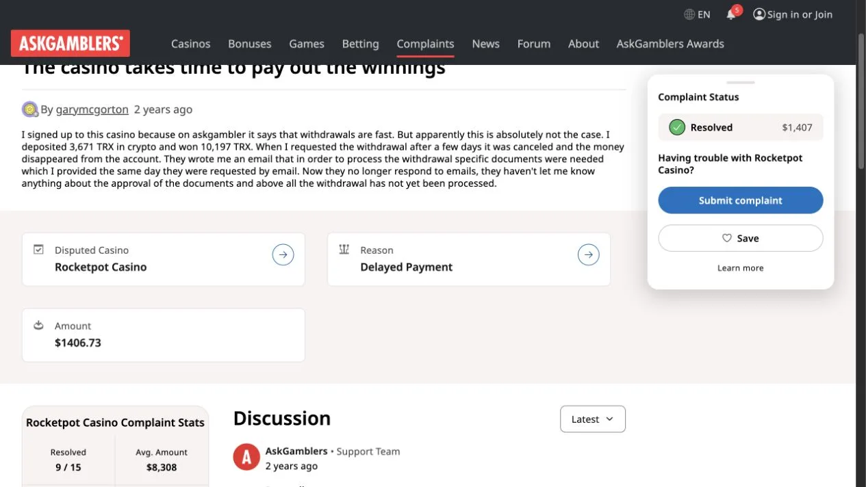 An AskGamblers Rocketpot case describes a TRX withdrawal held up by document checks. The captured complaint is marked “Resolved”, with a disputed amount of about US$1,407.